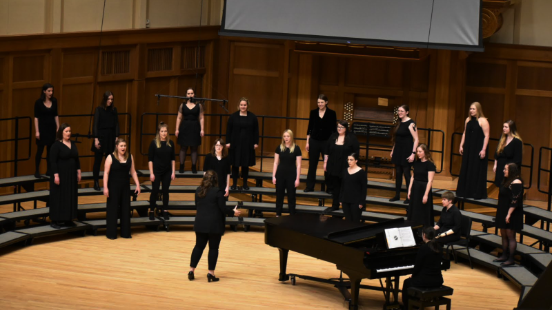 choir singing on chapel stage